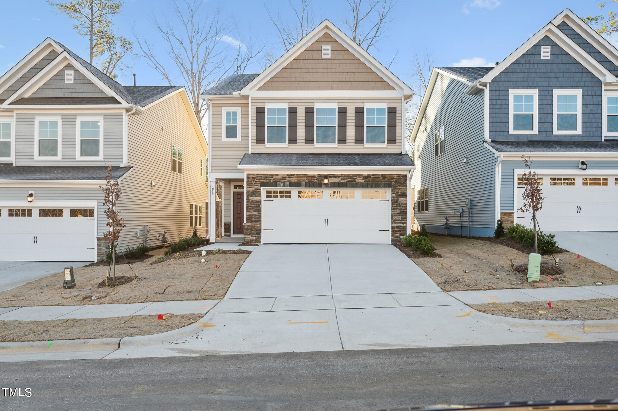 532 Hanover Shore Lane Raleigh, NC 27610 - Photo 1 of 31 a front view of a house with a yard