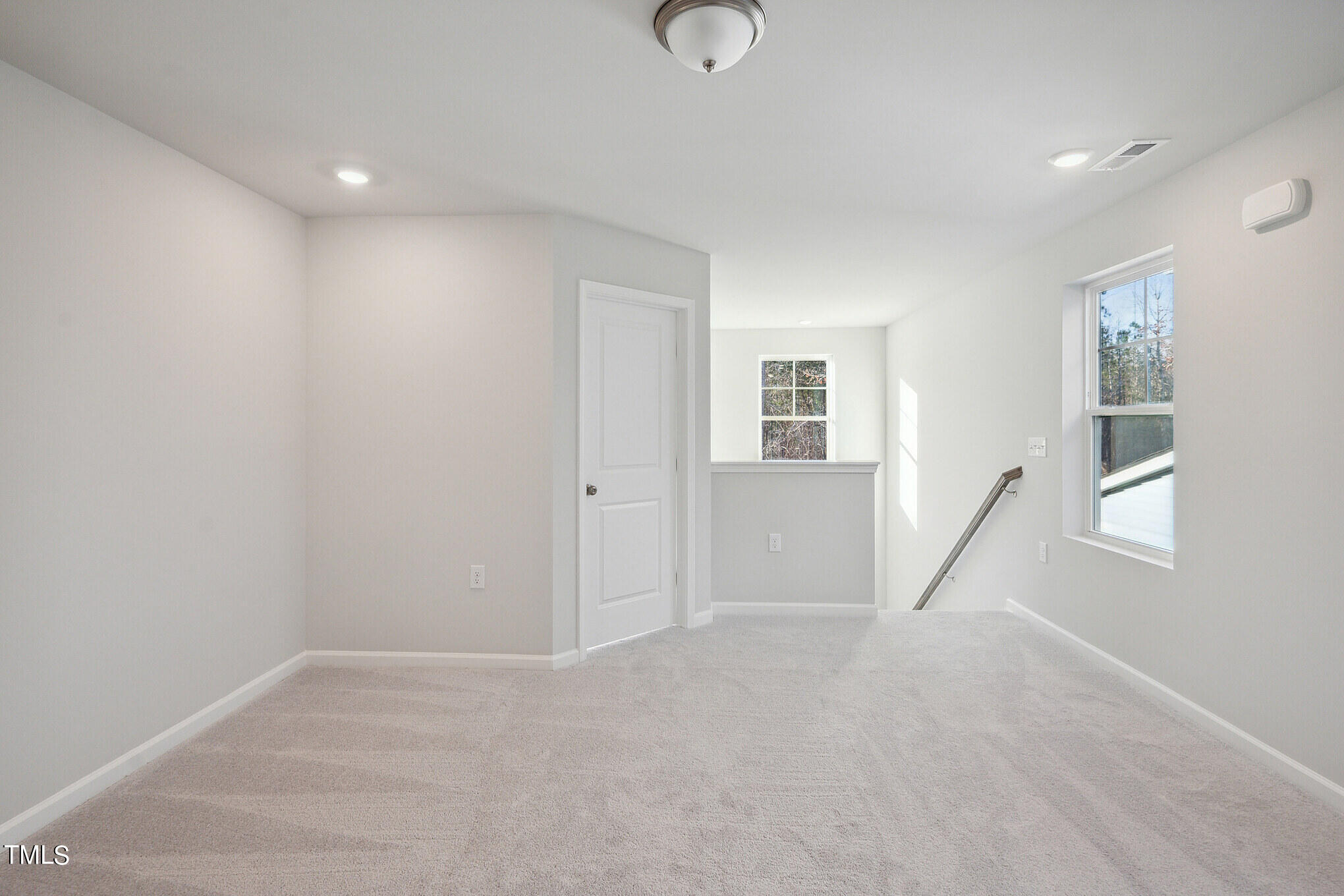 532 Hanover Shore Lane Raleigh, NC 27610 - Photo 14 of 31 a view of an empty room with a window