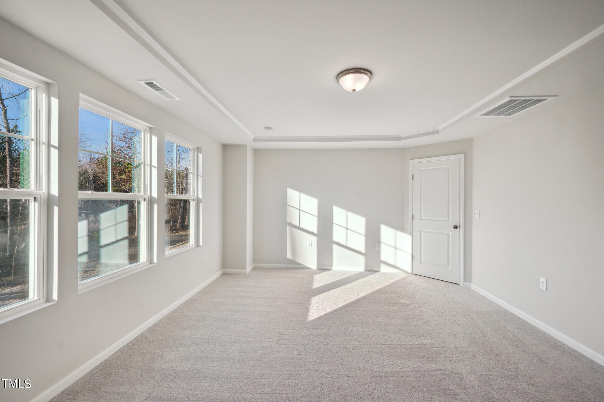 532 Hanover Shore Lane Raleigh, NC 27610 - Photo 21 of 31 a view of an empty room with a window