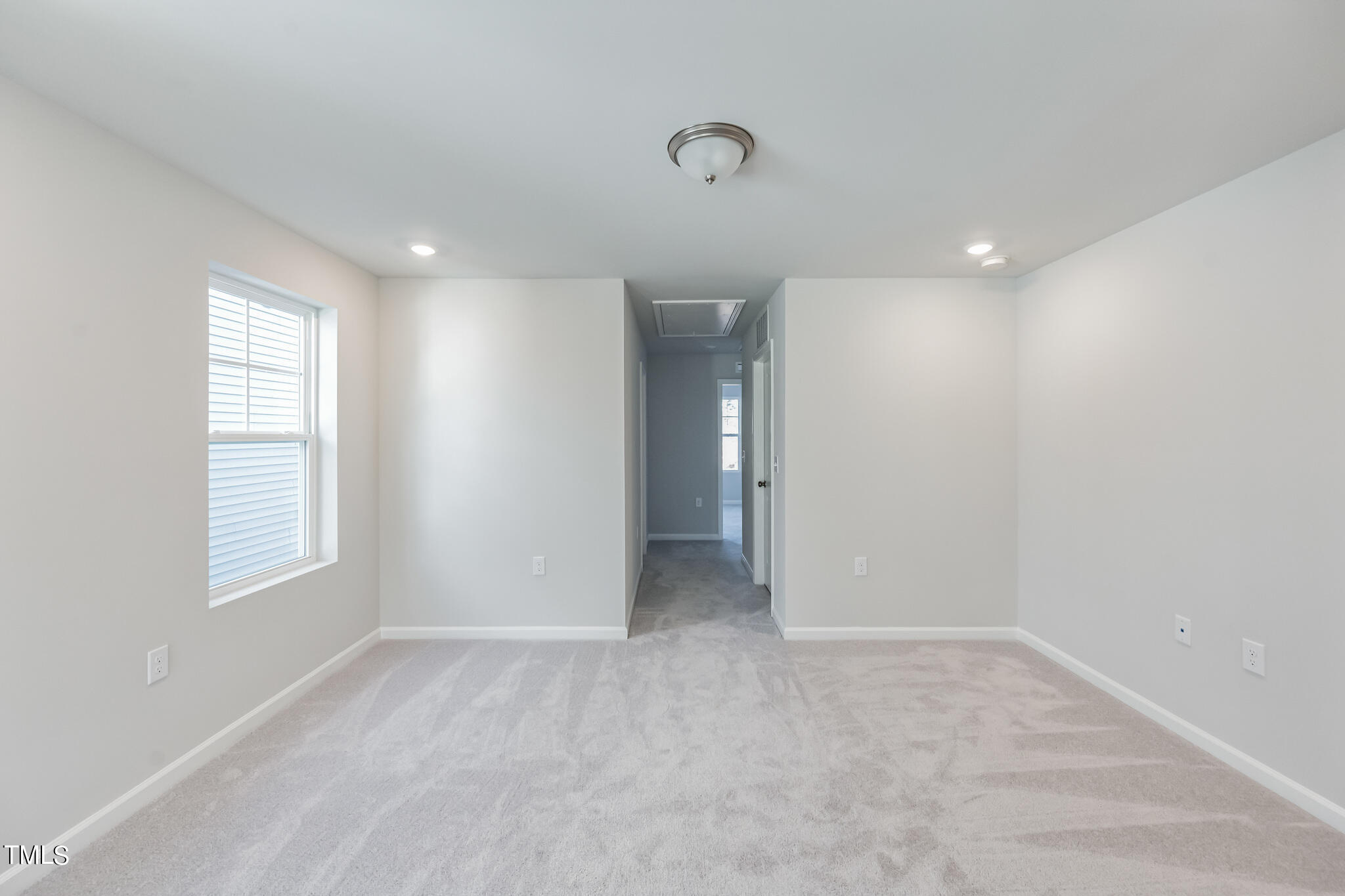 532 Hanover Shore Lane Raleigh, NC 27610 - Photo 27 of 31 an empty room with windows and closet