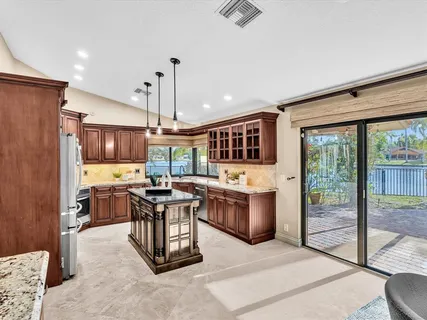 $899,998 | 10320 Northwest 6th Street, Coral Springs, FL 33071