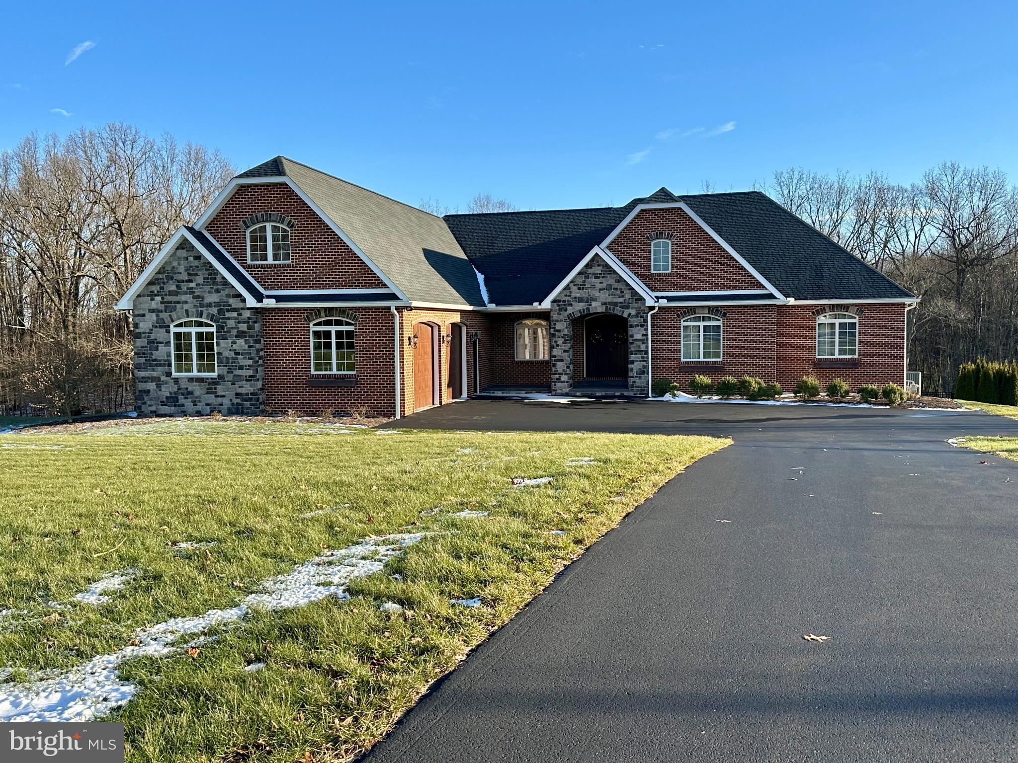 Charming brick home with scenic surroundings.