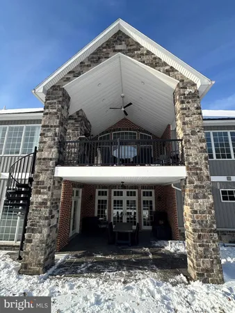 a view of a balcony with chairs