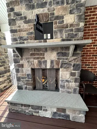 a bathroom with a toilet a sink and a mirror