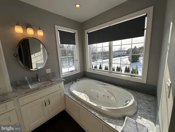 a kitchen with a sink and a refrigerator