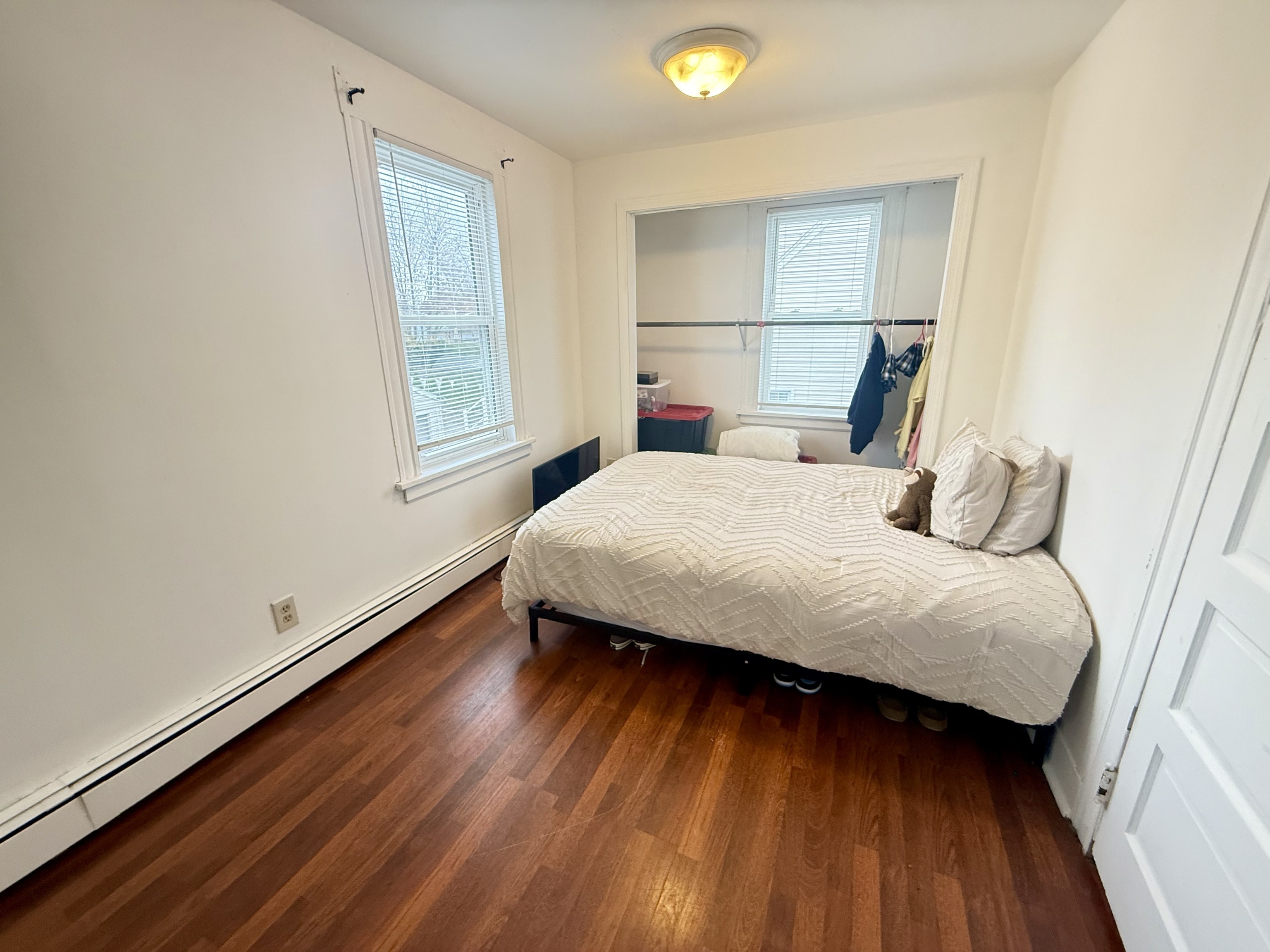 419 Huntington Road Stratford, CT 06614 - Photo 13 of 40 a bedroom with a bed and a window