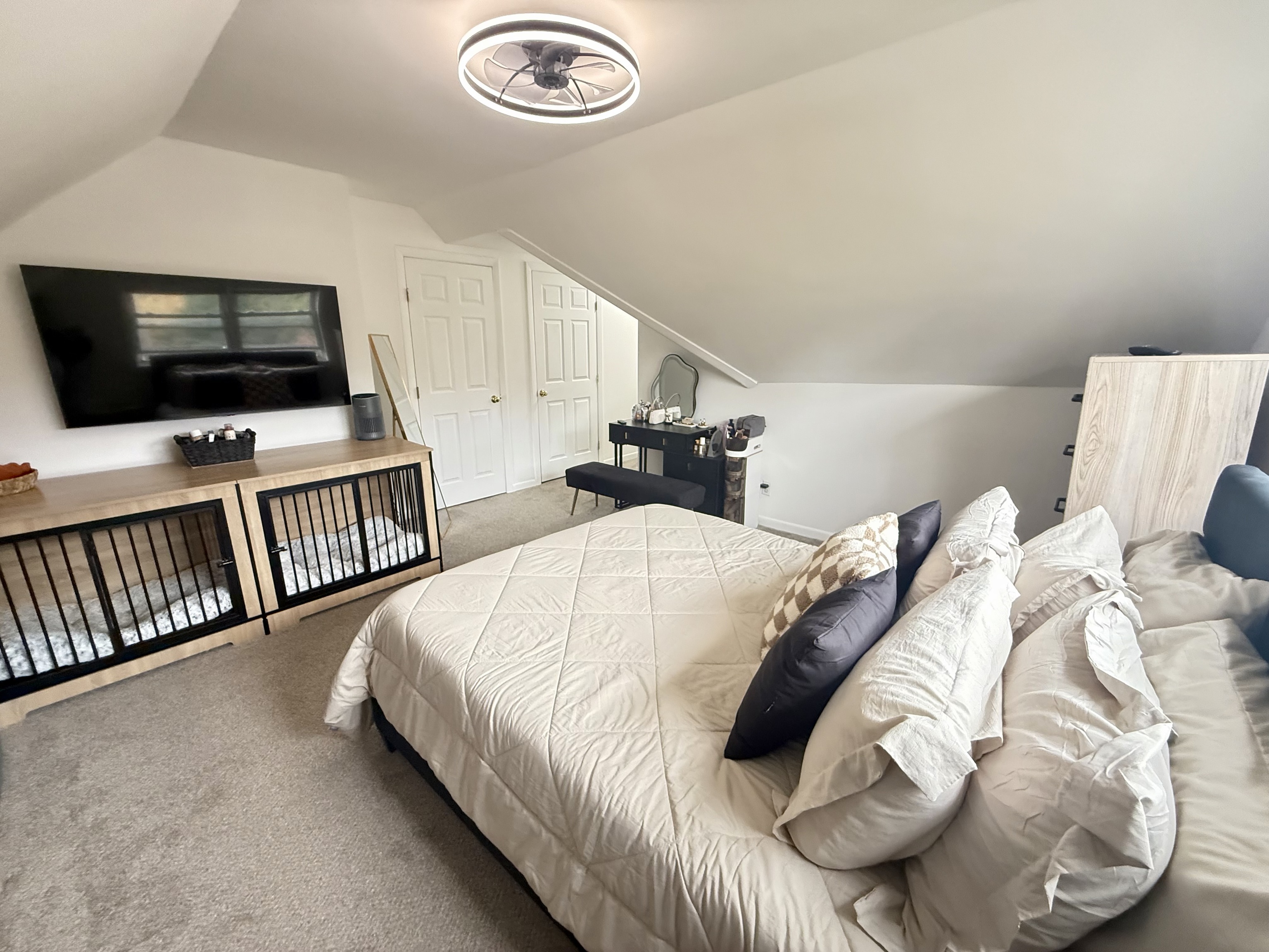 419 Huntington Road Stratford, CT 06614 - Photo 15 of 40 a bedroom with a bed and a flat screen tv