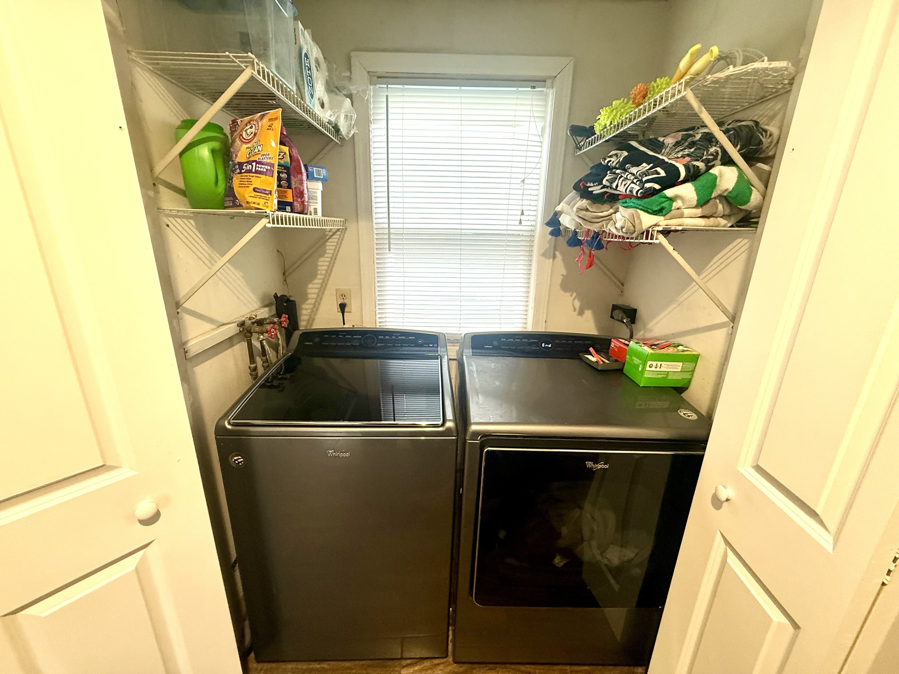 419 Huntington Road Stratford, CT 06614 - Photo 25 of 40 a close up of a sink and a washer dryer
