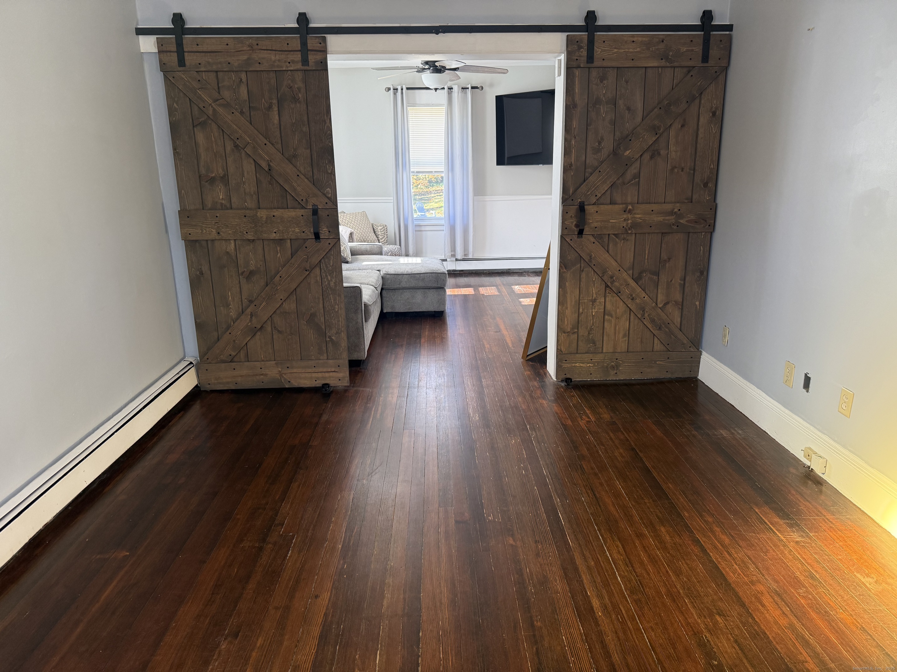 419 Huntington Road Stratford, CT 06614 - Photo 9 of 40 wooden floor in an empty room