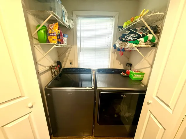 a close up of a sink and a washer dryer