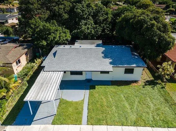 a view of a backyard with a garden