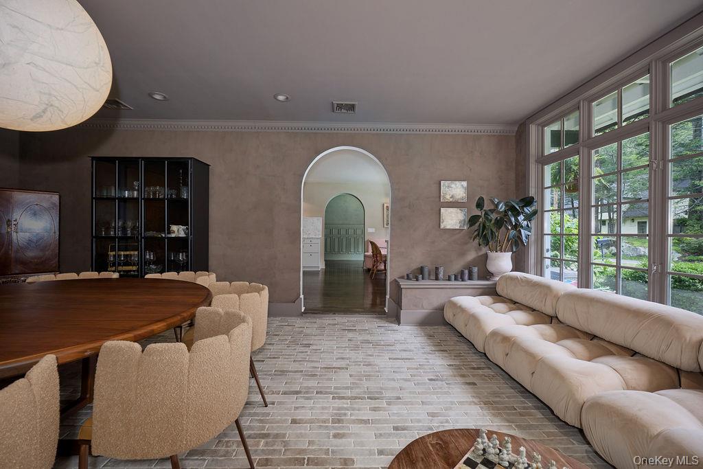 24 Acoma Road Tuxedo Park, NY 10987 - Photo 12 of 44 a living room with furniture and a large window