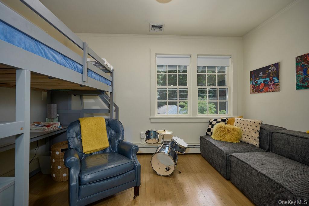 24 Acoma Road Tuxedo Park, NY 10987 - Photo 21 of 44 a living room with furniture and window