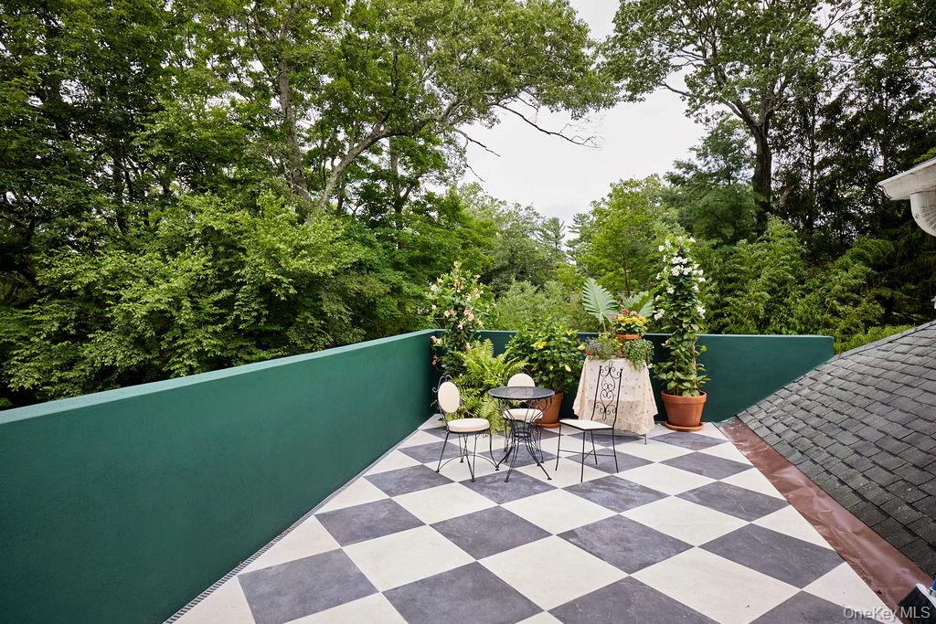 24 Acoma Road Tuxedo Park, NY 10987 - Photo 28 of 44 a view of backyard with a patio