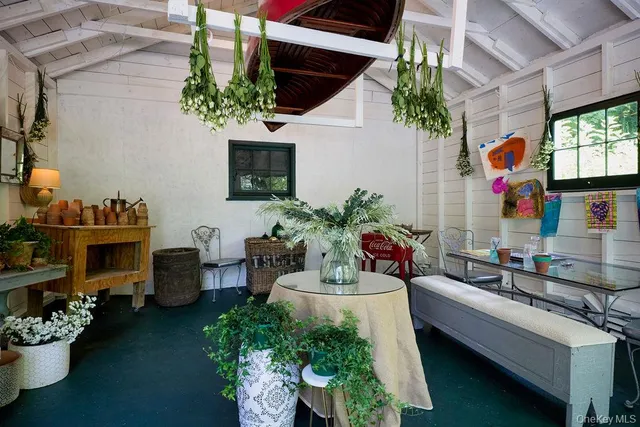 a outdoor space with lots of potted plants