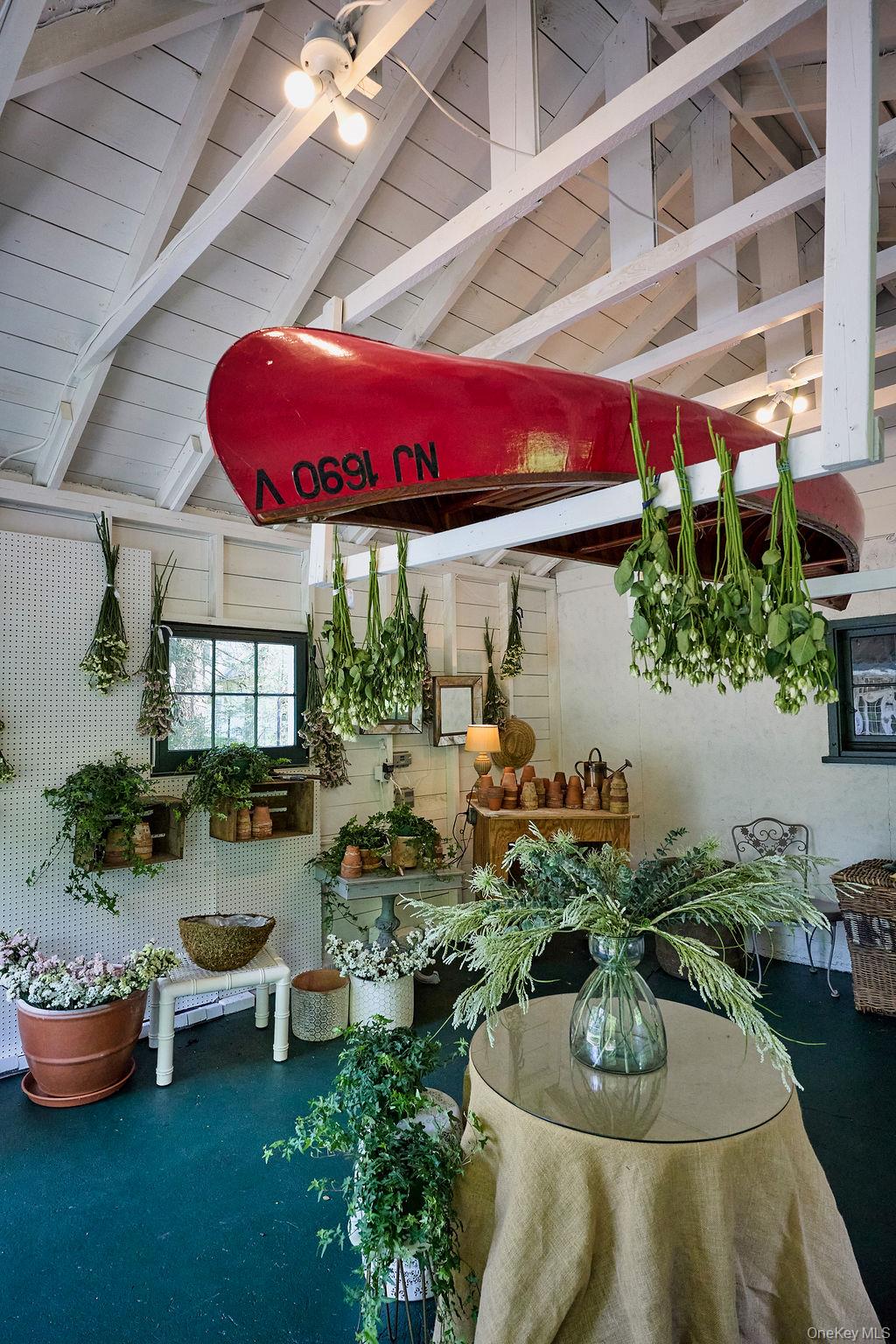 24 Acoma Road Tuxedo Park, NY 10987 - Photo 36 of 44 a outdoor space with lots of potted plants