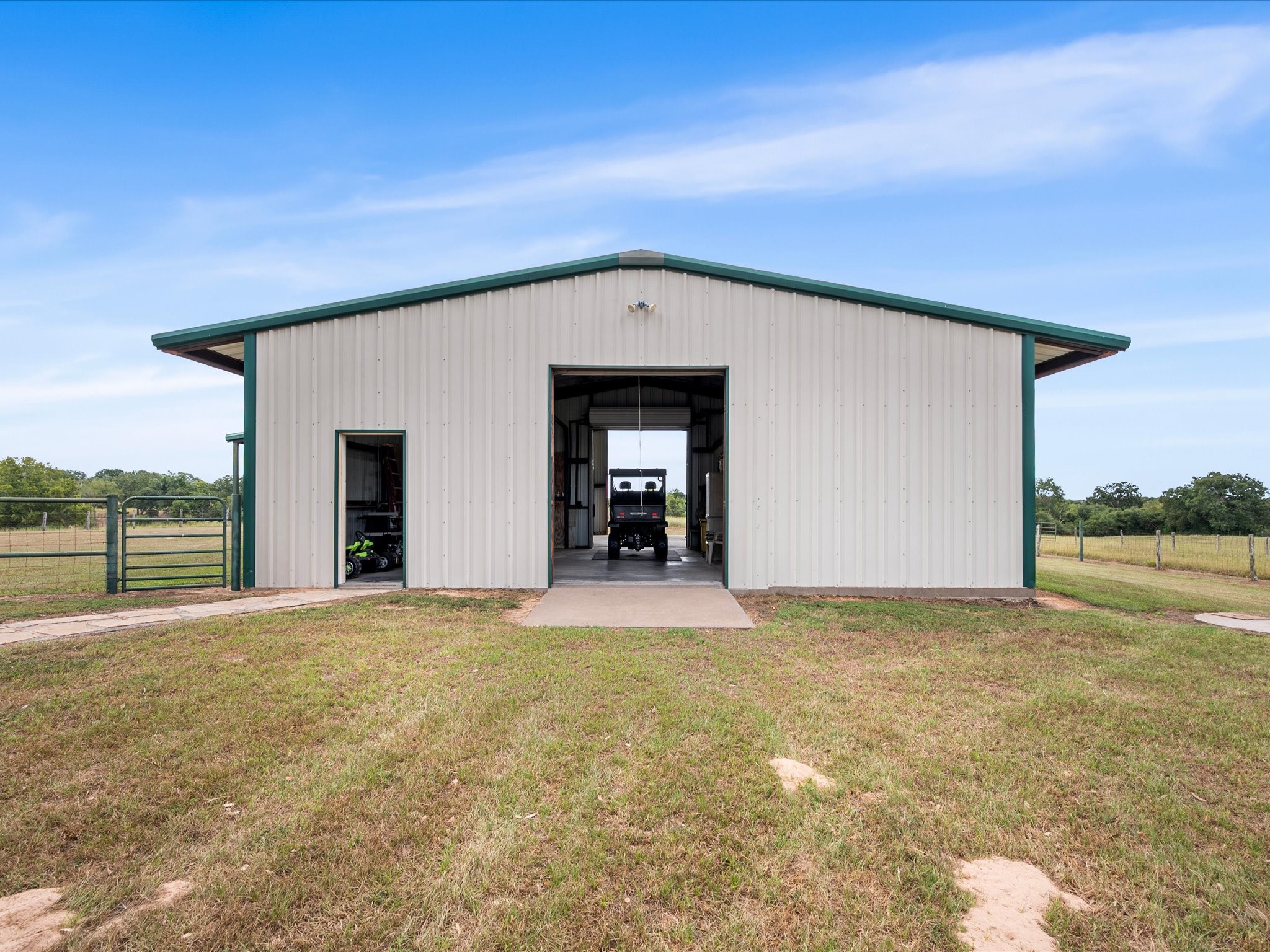 19929 Pierceall Road Hempstead, TX 77445 - Photo 33 of 50 With its generous footprint and versatile design, the barn offers exceptional functionality for horses, equipment, storage, and more.
