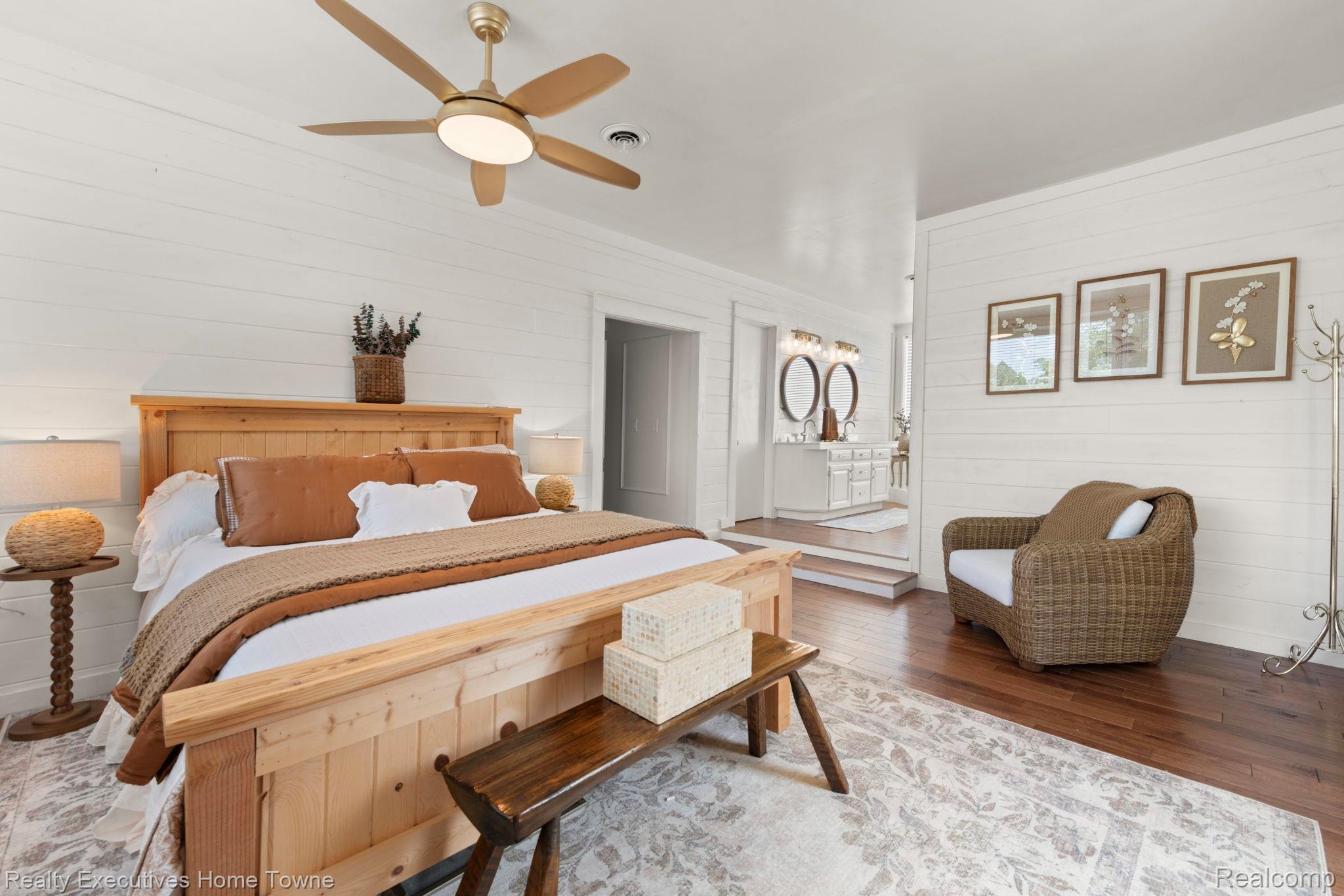 8308 Lakeshore Road Fort Gratiot, MI 48059 - Photo 62 of 79 Spacious room featuring white shiplap walls, wood-finish flooring, a contemporary ceiling fan, and recessed lighting