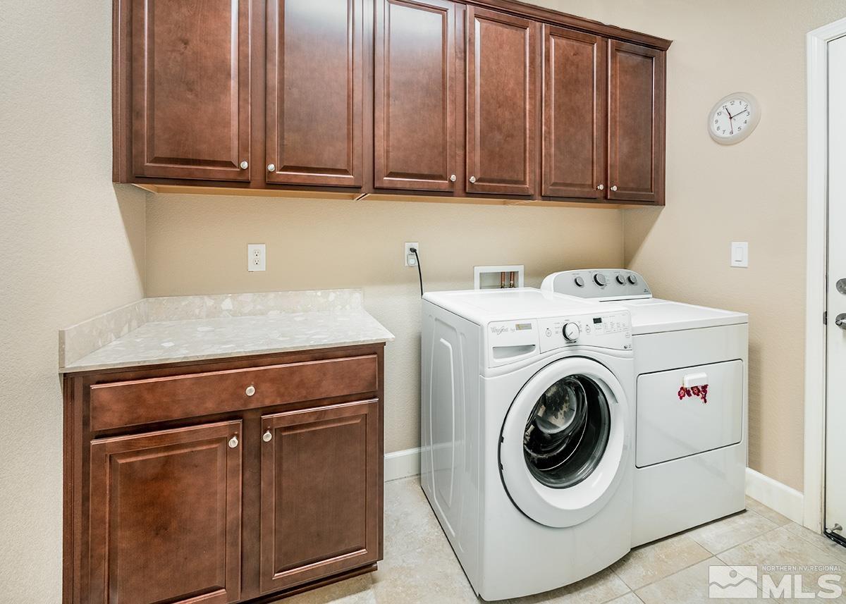 10250 Mott Drive Reno, NV 89521 - Photo 15 of 20 a utility room with dryer and washer