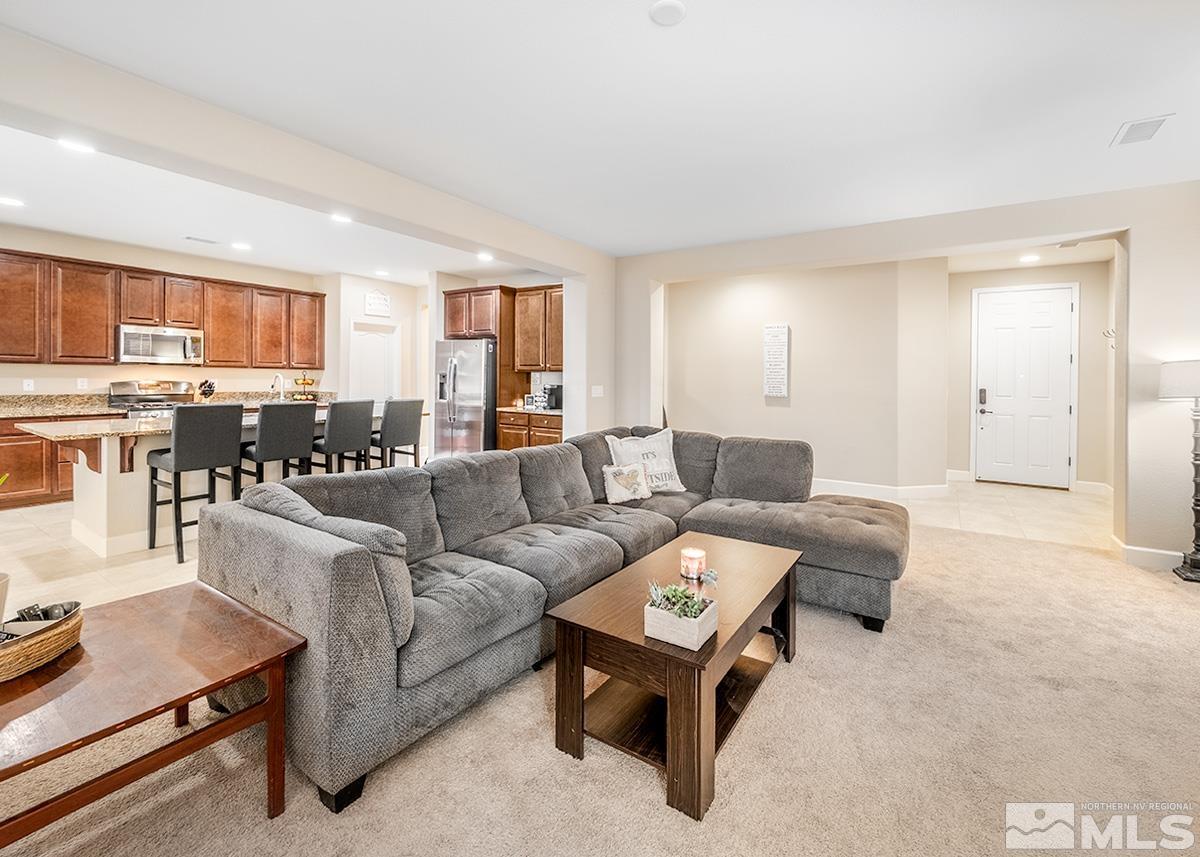 10250 Mott Drive Reno, NV 89521 - Photo 2 of 20 a living room with furniture and a large window