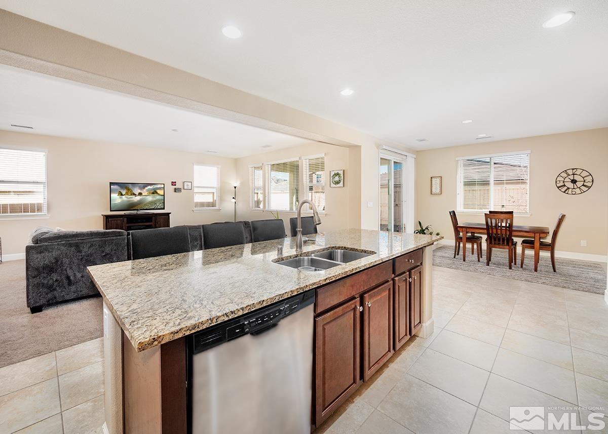 10250 Mott Drive Reno, NV 89521 - Photo 4 of 20 a large kitchen with granite countertop lots of counter top space