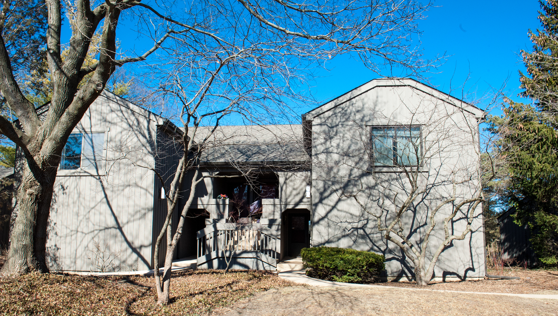 25 B Shoreline Road, Unit C345 Lake Barrington, IL 60010 - Photo 1 of 42 a view of a house with large windows