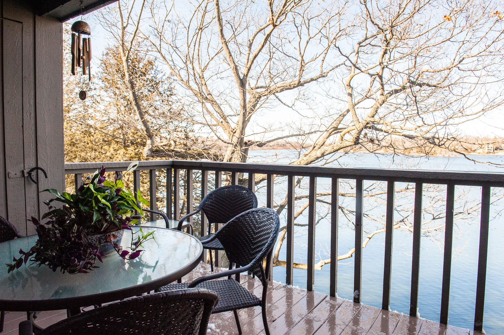 25 B Shoreline Road, Unit C345 Lake Barrington, IL 60010 - Photo 17 of 42 a table and chairs in a balcony