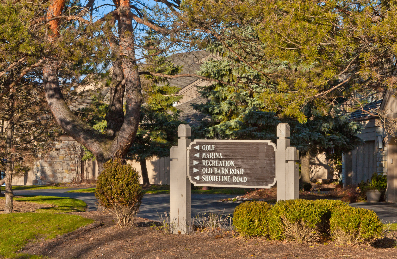 25 B Shoreline Road, Unit C345 Lake Barrington, IL 60010 - Photo 31 of 42 a sign on the side of a road