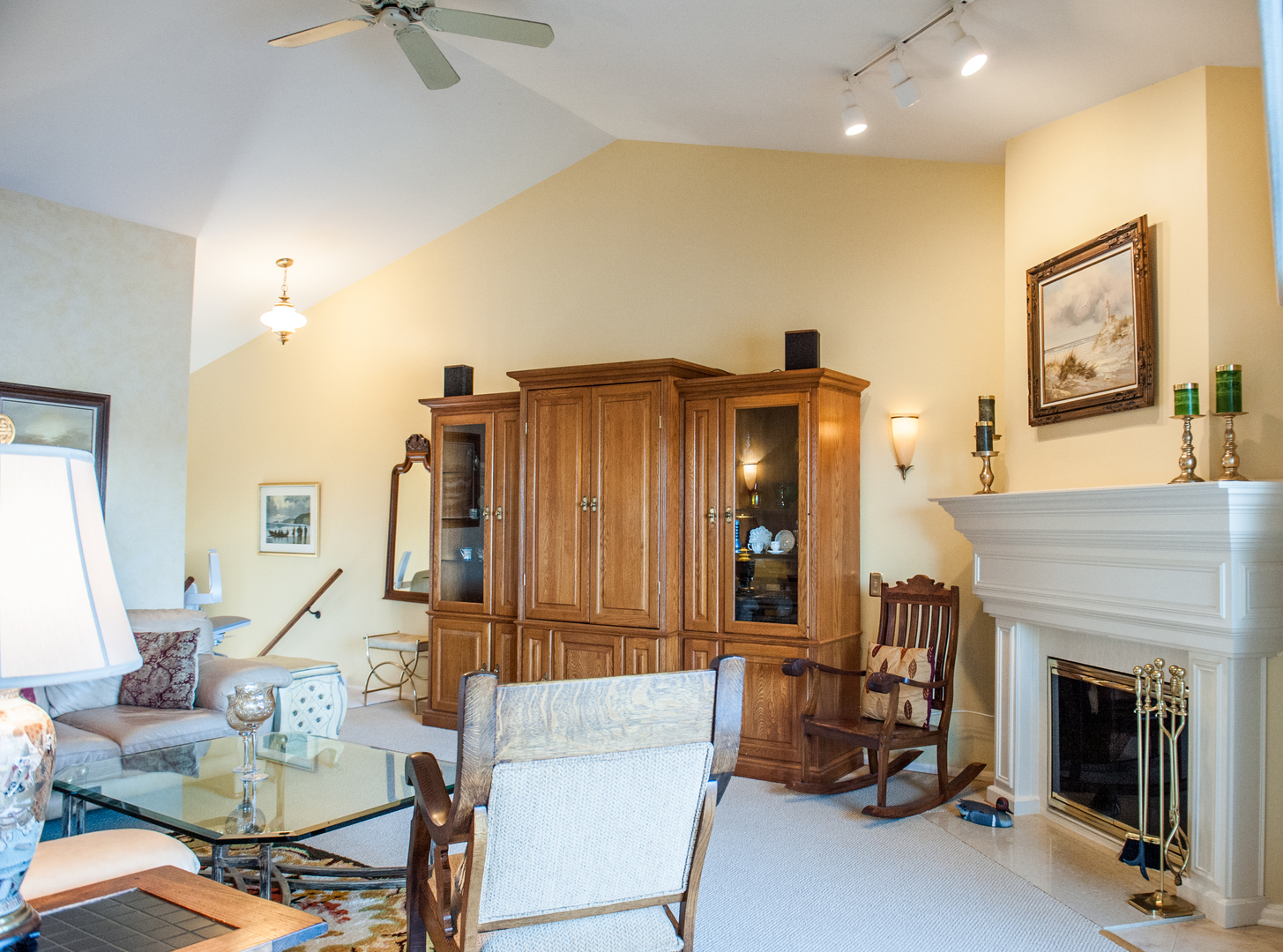 25 B Shoreline Road, Unit C345 Lake Barrington, IL 60010 - Photo 5 of 42 a living room with furniture and a fireplace