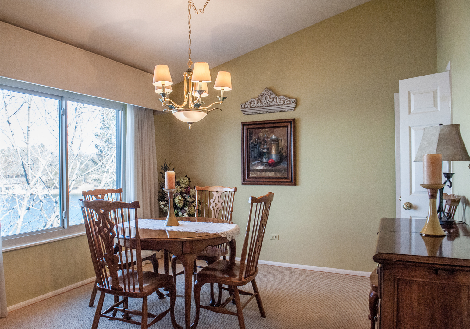 25 B Shoreline Road, Unit C345 Lake Barrington, IL 60010 - Photo 6 of 42 a view of a dining room with furniture window and outside view
