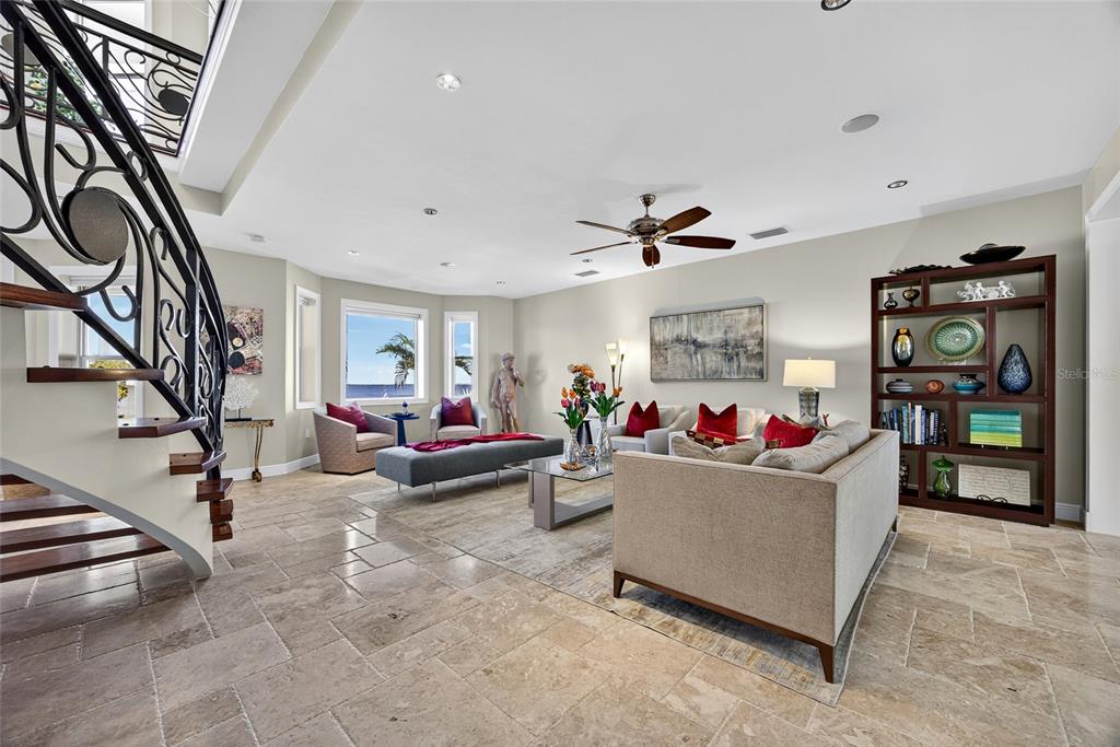 44 Colony Point Drive Punta Gorda, FL 33950 - Photo 11 of 84 a living room with furniture and a flat screen tv