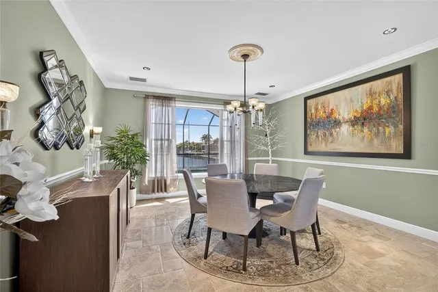 a kitchen with stainless steel appliances granite countertop a stove a sink dishwasher and a refrigerator