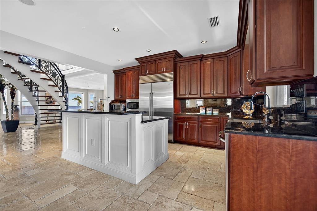 44 Colony Point Drive Punta Gorda, FL 33950 - Photo 20 of 84 a kitchen with stainless steel appliances granite countertop a stove a sink dishwasher and a refrigerator