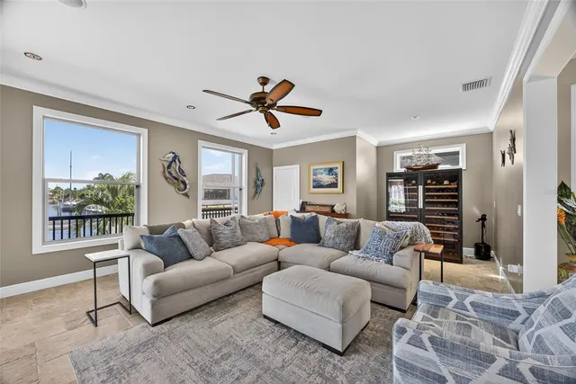a bedroom with furniture and a flat screen tv