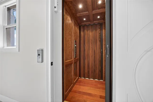 a en suite bathroom with a granite countertop sink a toilet and shower