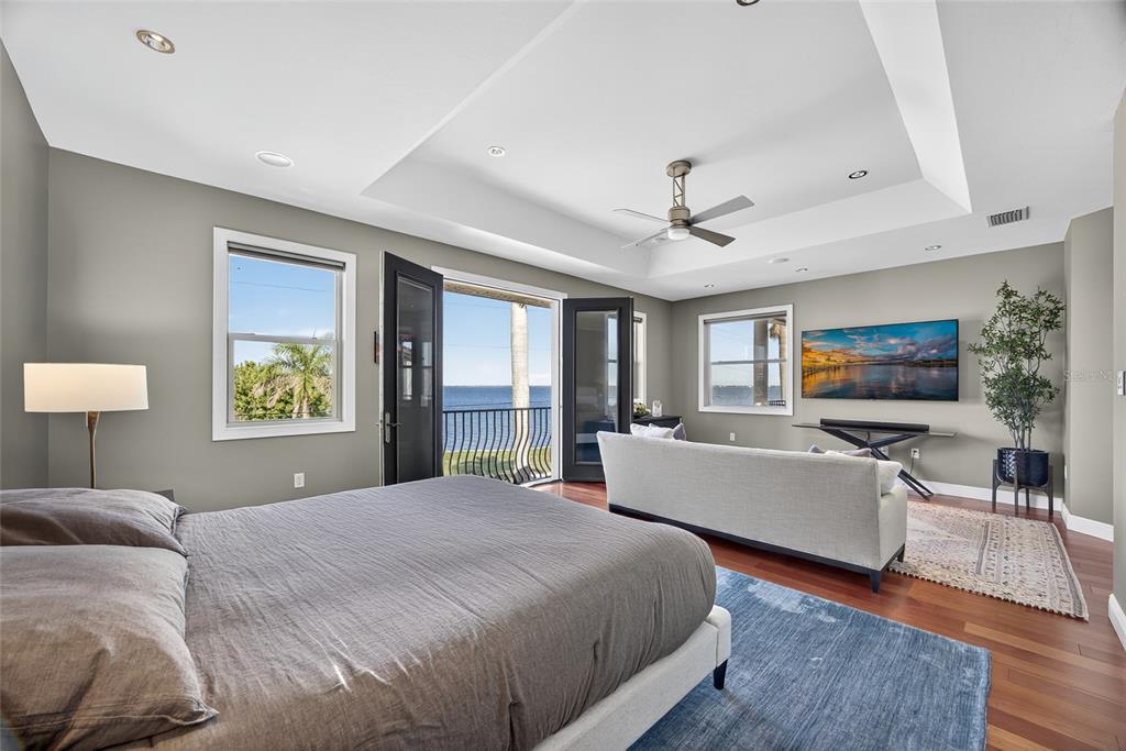 44 Colony Point Drive Punta Gorda, FL 33950 - Photo 39 of 84 a bedroom with a large bed and a window