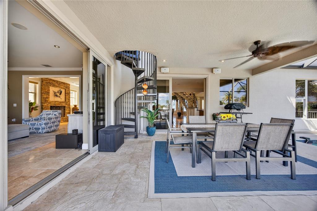 44 Colony Point Drive Punta Gorda, FL 33950 - Photo 65 of 84 a living room with lots of furniture and view of kitchen