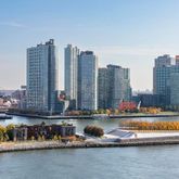 a view of a city with tall buildings