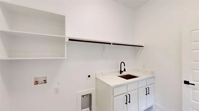 a bathroom with a sink and mirror