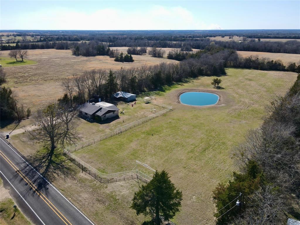 7615 Farm To Market 1499 Sumner, TX 75486 - Photo 2 of 18 a view of a water pond