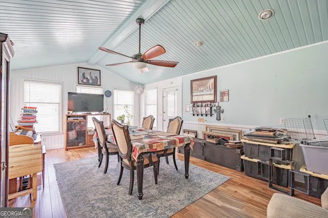 a view of a dining room with furniture
