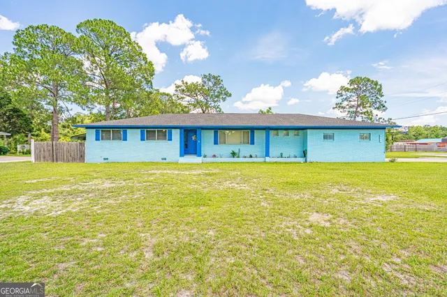 a view of a house with a swimming pool