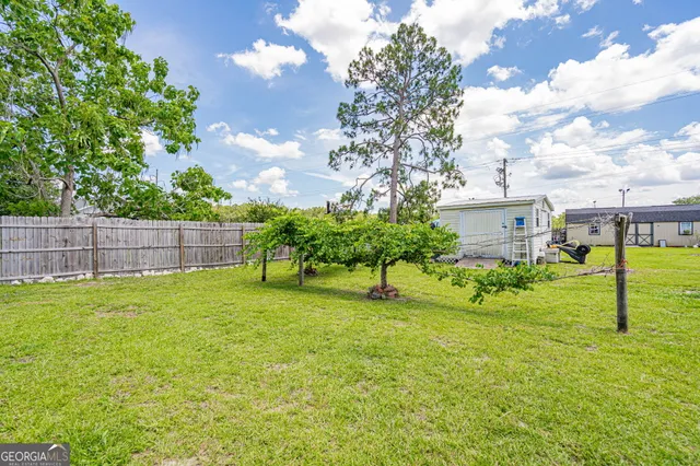 a view of garden with patio