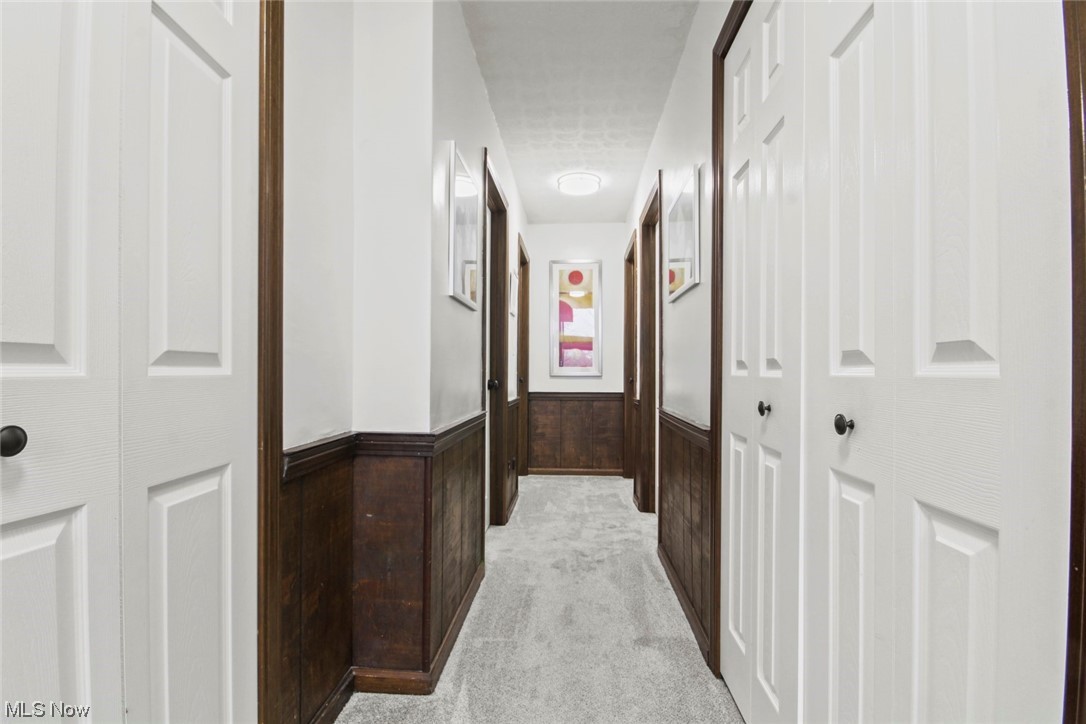 7550 South Raccoon Road Canfield, OH 44406 - Photo 10 of 32 Corridor with light carpet