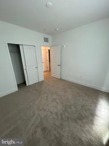 an empty room with a natural light