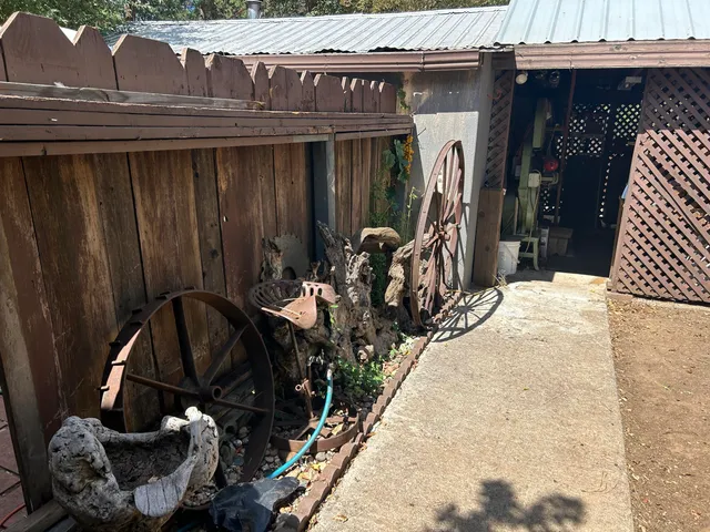 a living room filled with furniture and a chandelier