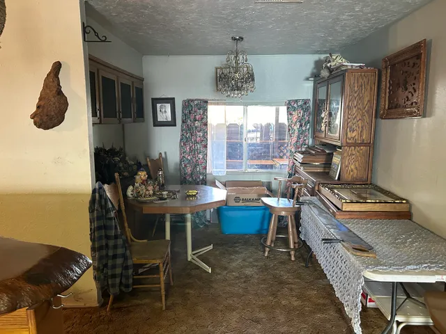 a kitchen with sink cabinets and window