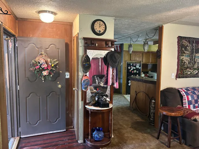 a bathroom with a sink mirror and toilet