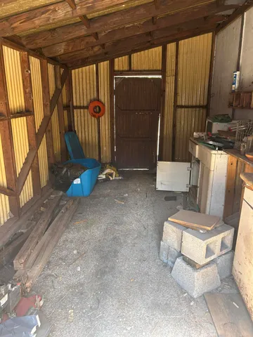 a view of a porch with furniture