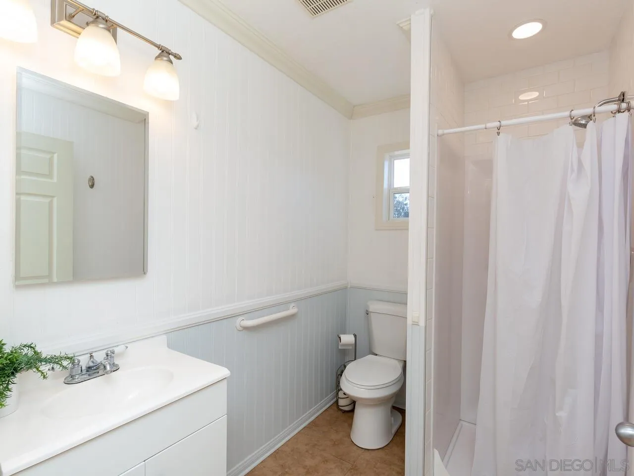 1732 Tavern Road Alpine, CA 91901 - Photo 11 of 60 a bathroom with a sink a toilet and shower